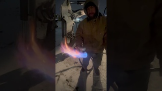 Using a torch on frozen hydraulic lines #construction #problemsolving #bobcat