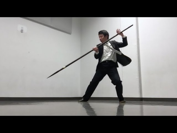 An action using lance. Japanese businessman game style action